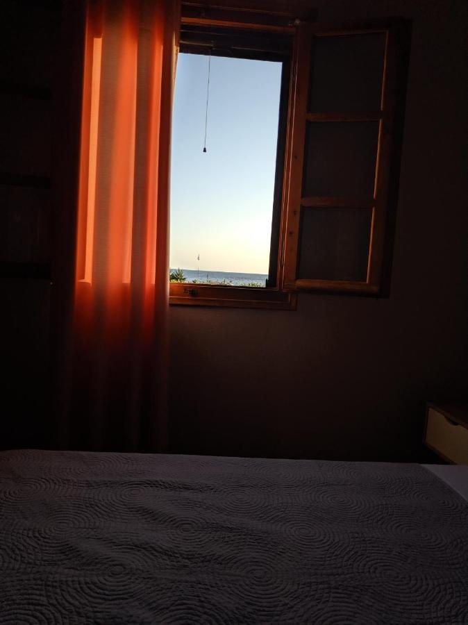 شقة Tramonto Nel Delfini Kini المظهر الخارجي الصورة