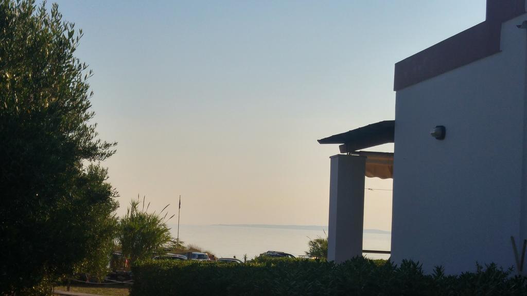شقة Tramonto Nel Delfini Kini المظهر الخارجي الصورة